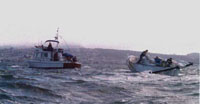 Sailboat under tow