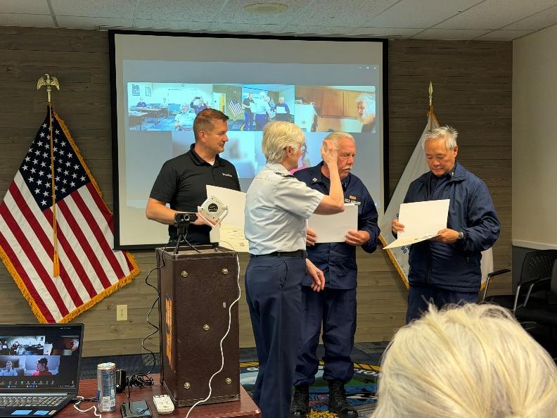 Bellingham, Wash – Flotilla members receive awards. US Coast Guard photo by Mike Hayner.