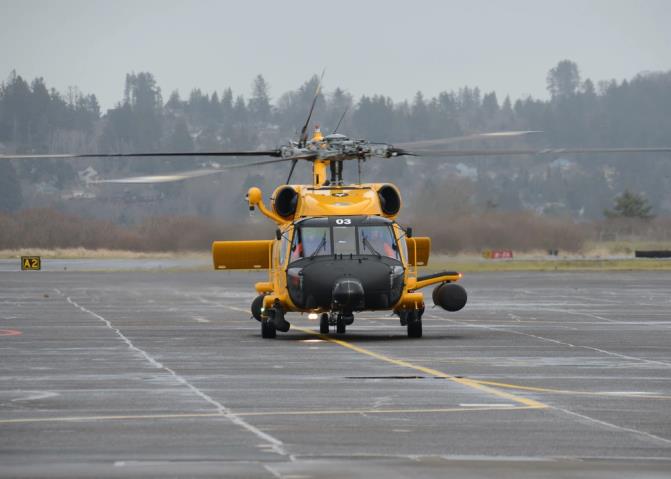 Astoria, OR – An MH-60T Jayhawk in the special yellow livery commemorating 100 years of Coast Guard aviation. US Coast Guard photo.
